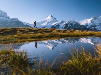 Hike near Bachalpsee, with the snow-capped Schreckhorn in the background.